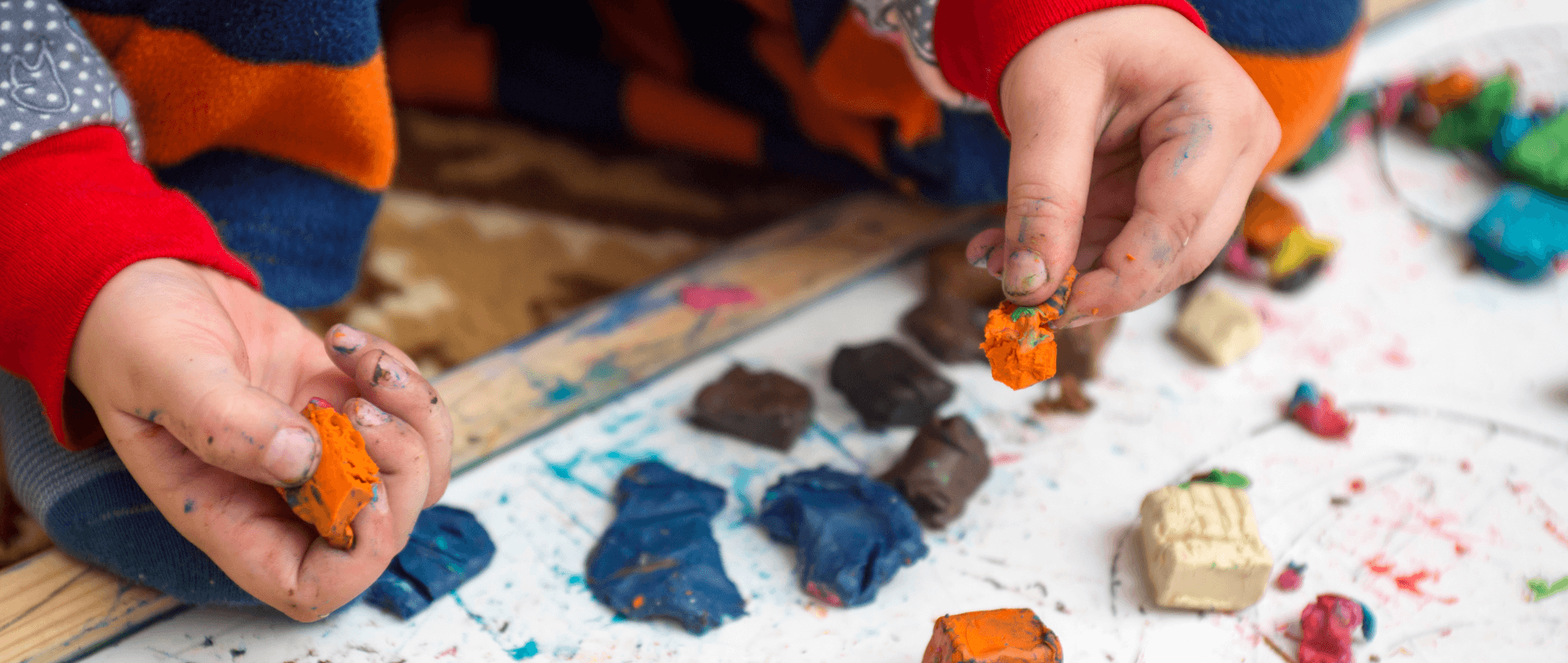 Child playing with clay