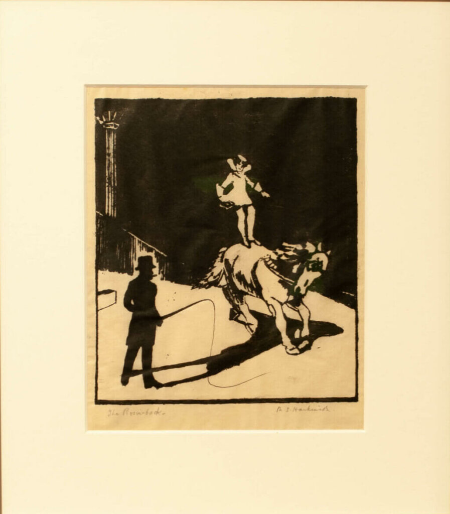 A print of a circus performer standing on the back of a horse while the ringleader stands by with a whip.