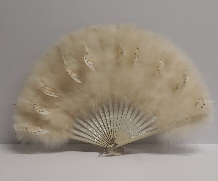 A white feather fan spread open.