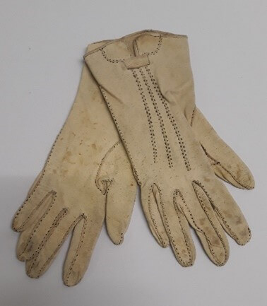 A pair of white gloves.