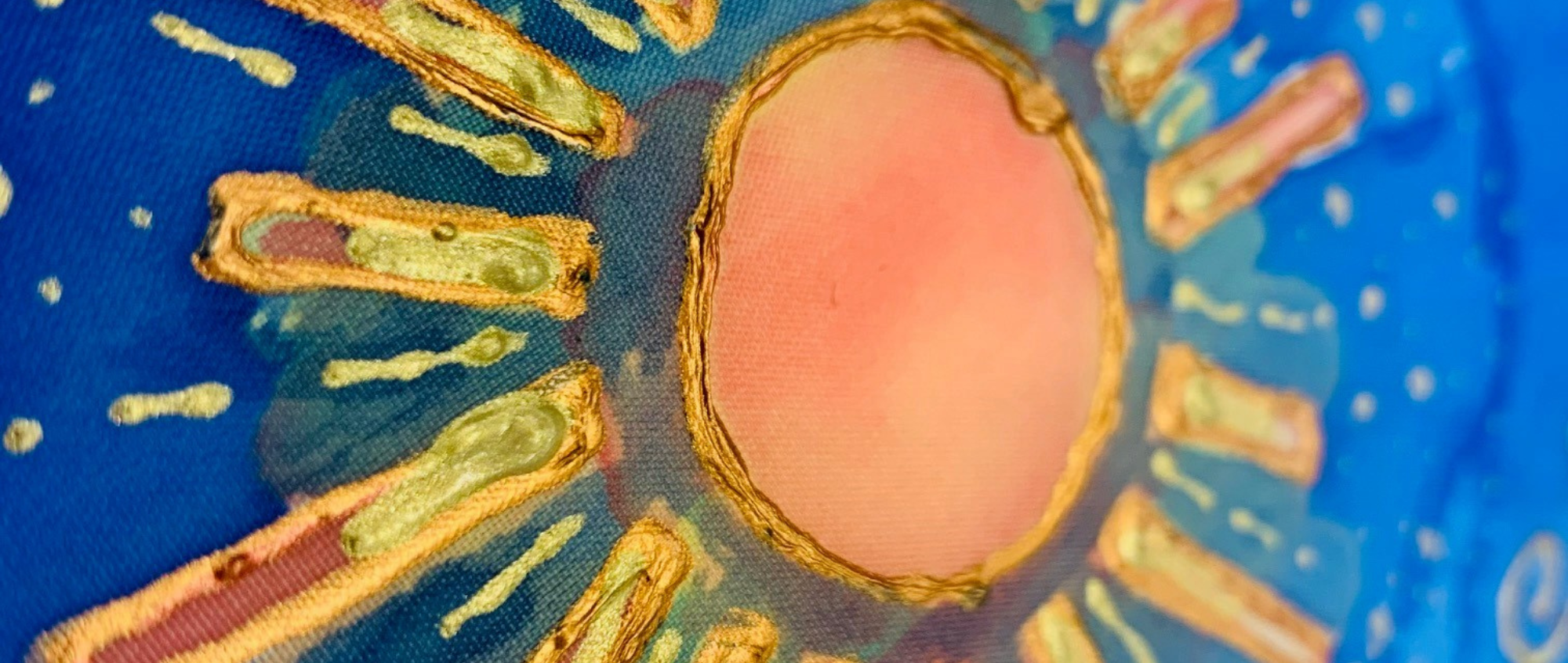 Silk Painting of a yellow sun with a blue background