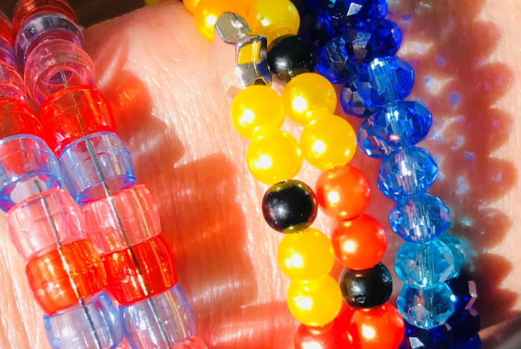 Beaded bracelets on a persons wrist