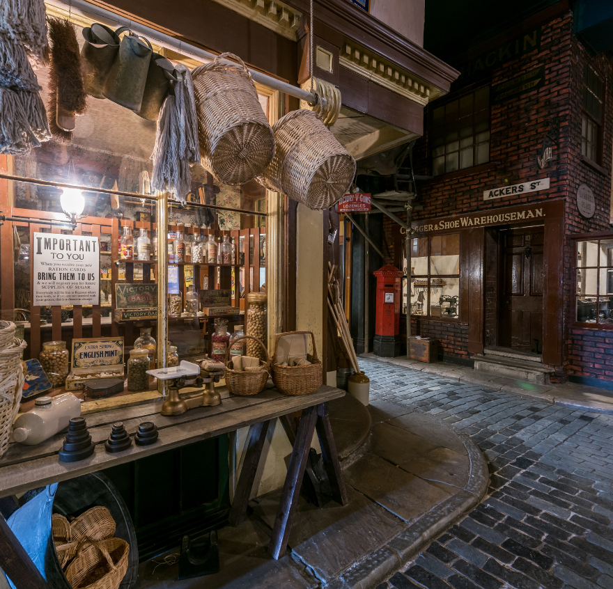 A Victorian Shop front at night.
