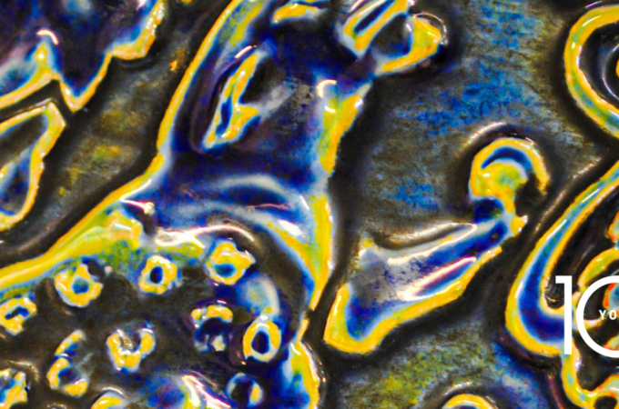 Pilkington's tile with Your Salford 100 logo